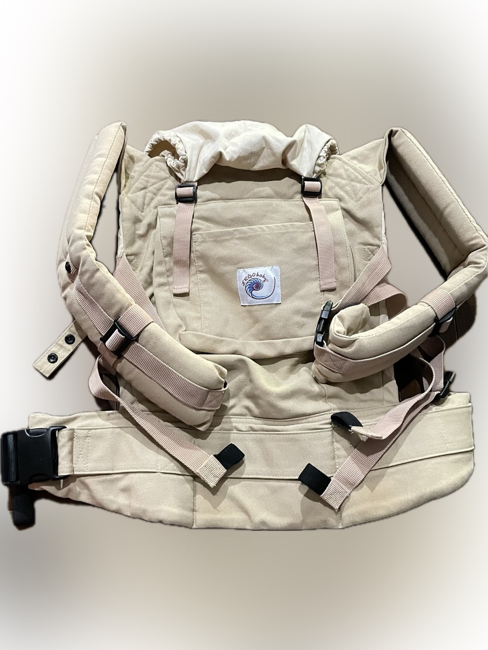 Ergobaby Original Carrier in beige or khaki color.